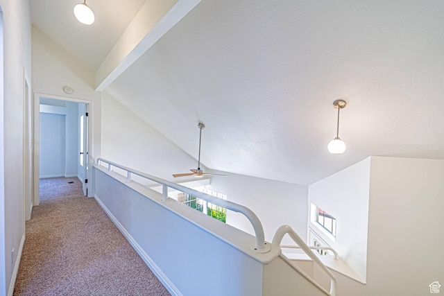 5457 S Break Water Dr W, Taylorsville, UT 84123 - hall with lofted ceiling, carpet floors, and baseboards