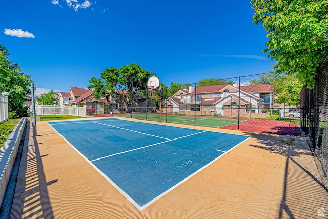 5457 S Break Water Dr W, Taylorsville, UT 84123 - view of tennis court featuring community basketball court and a residential view