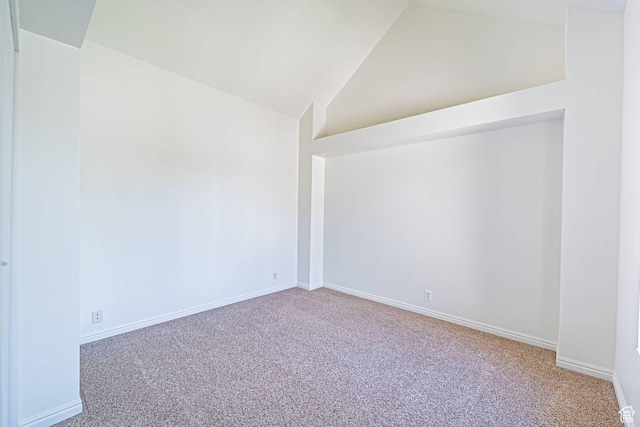 5457 S Break Water Dr W, Taylorsville, UT 84123 - carpeted spare room with lofted ceiling and baseboards