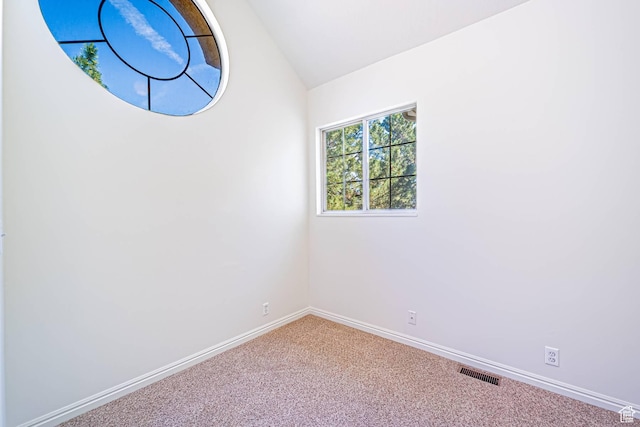 5457 S Break Water Dr W, Taylorsville, UT 84123 - carpeted empty room featuring lofted ceiling and baseboards
