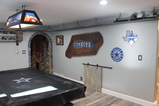 730 S 300 W, Garland, UT 84312 - game room with wood finished floors, baseboards, recessed lighting, a barn door, and pool table