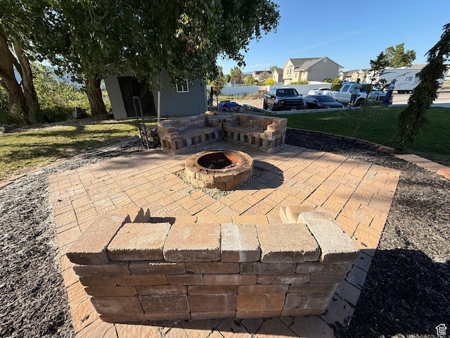 730 S 300 W, Garland, UT 84312 - view of patio / terrace with a residential view, a fire pit, and an outdoor structure