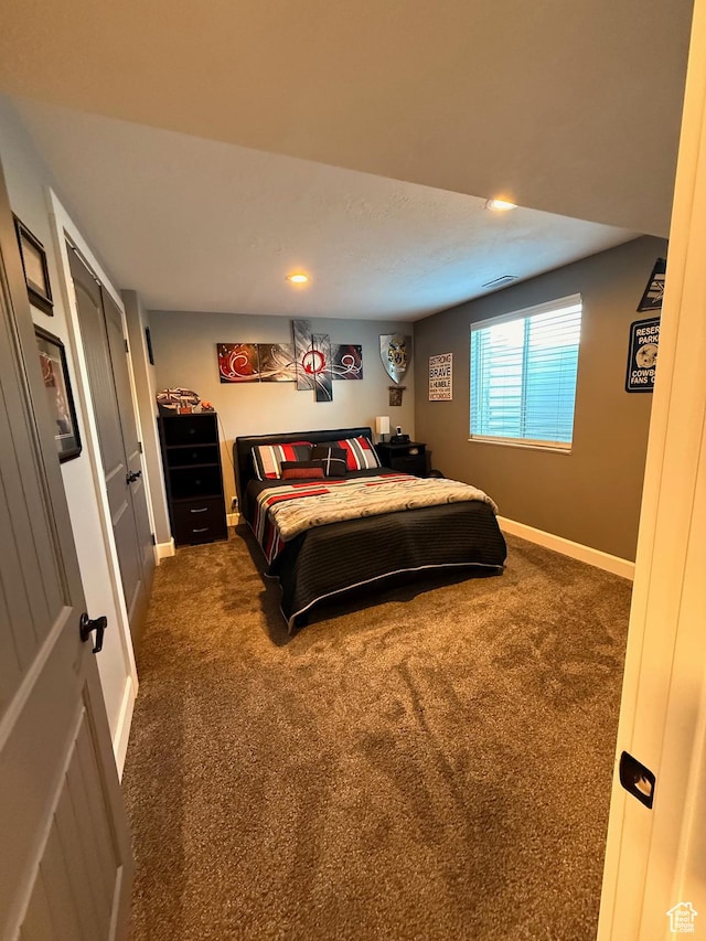 730 S 300 W, Garland, UT 84312 - bedroom with dark carpet, baseboards, and recessed lighting
