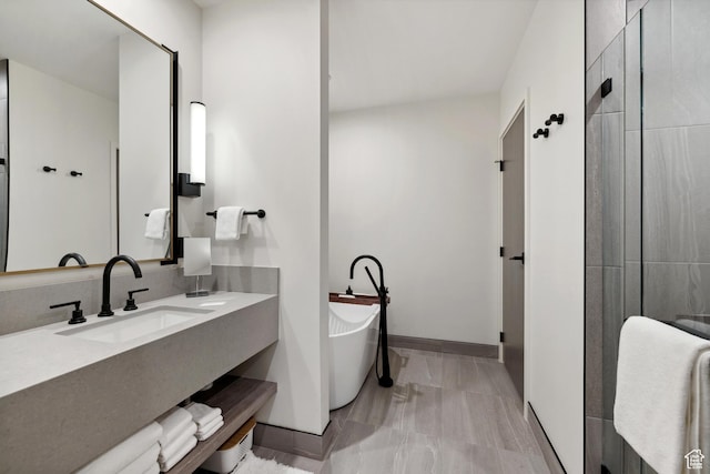 2417 W High Rd Unit 1504, Park City, UT 84098 - bathroom with a soaking tub, vanity, and baseboards