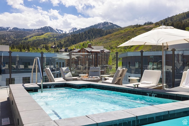 2417 W High Rd Unit 1504, Park City, UT 84098 - community pool with a mountain view and a view of trees