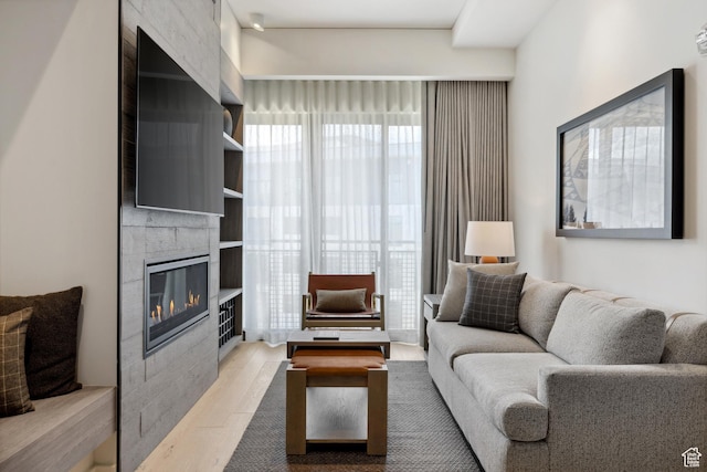 2417 W High Rd Unit 1504, Park City, UT 84098 - living area with a fireplace and wood finished floors