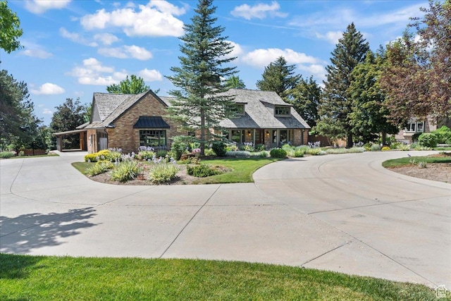 3 Dawn Hill Dr, Sandy, UT 84092 - view of front of home with curved driveway and an attached carport