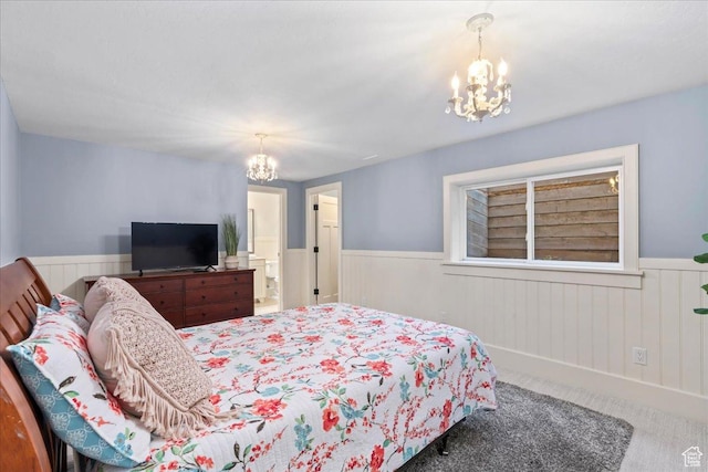 3 Dawn Hill Dr, Sandy, UT 84092 - carpeted bedroom featuring a chandelier, wainscoting, and connected bathroom