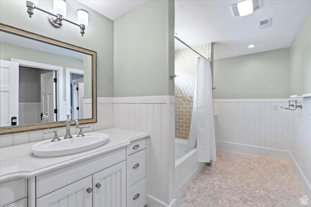 3 Dawn Hill Dr, Sandy, UT 84092 - full bathroom featuring wainscoting, vanity, shower / bath combo, and tile patterned flooring