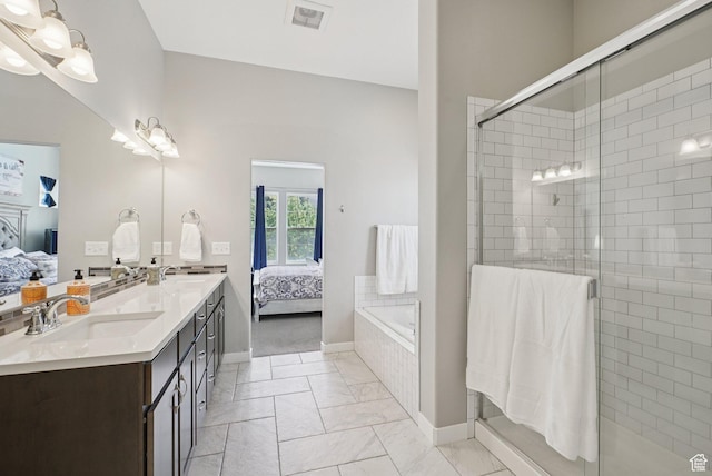 4411 W S Jordan Pkwy, South Jordan, UT 84009 - full bathroom with ensuite bath, double vanity, baseboards, and a shower stall