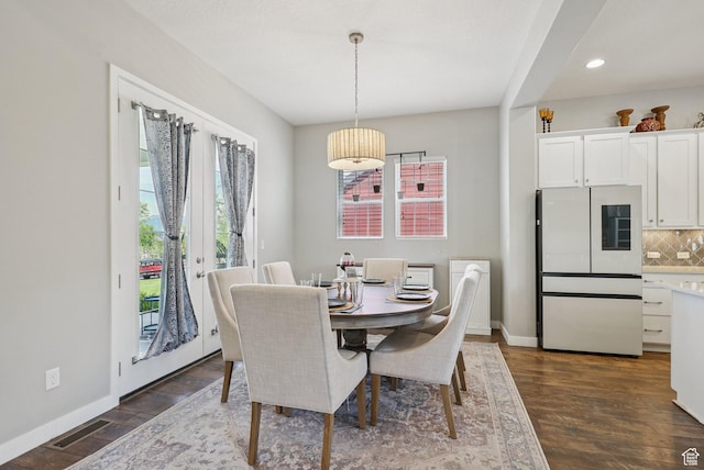 4411 W S Jordan Pkwy, South Jordan, UT 84009 - dining space with dark wood-style floors, baseboards, and recessed lighting