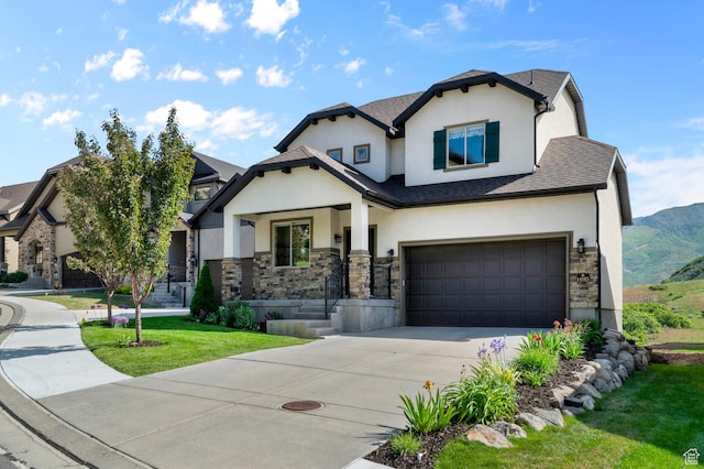 14585 S Delacroix Dr S, Draper, UT 84020 - view of front of house featuring stucco siding, stone siding, an attached garage, concrete driveway, and a front lawn