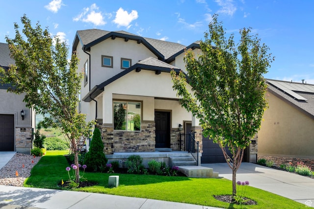 14585 S Delacroix Dr S, Draper, UT 84020 - view of front of home with an attached garage, driveway, stone siding, and stucco siding