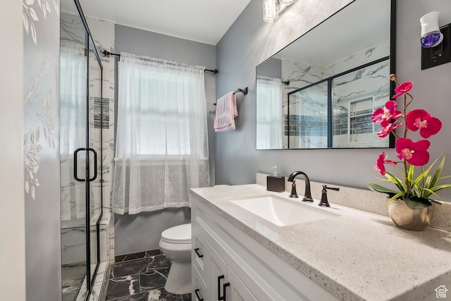 2058 Van Buren Ave, Ogden, UT 84401 - bathroom featuring marble finish flooring, vanity, a marble finish shower, and toilet