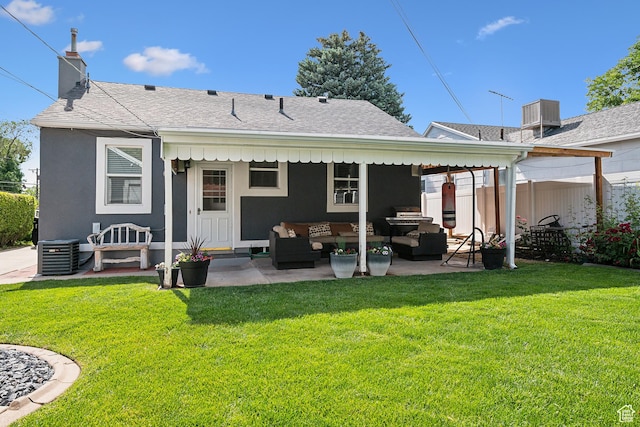 2058 Van Buren Ave, Ogden, UT 84401 - rear view of house featuring an outdoor living space, a patio area, central AC unit, a chimney, and a shingled roof
