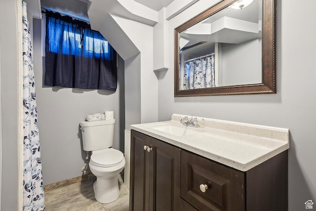 2058 Van Buren Ave, Ogden, UT 84401 - full bath with vanity, toilet, wood finished floors, and a shower with curtain