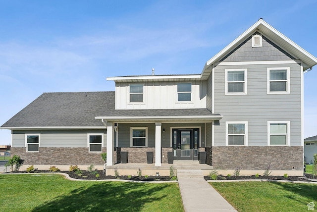 1184 S 2300 E, Spanish Fork, UT 84660 - craftsman inspired home featuring a porch, stone siding, and a front lawn