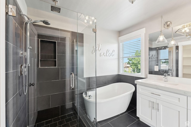 1184 S 2300 E, Spanish Fork, UT 84660 - full bathroom featuring a stall shower, vanity, tile patterned floors, and a freestanding bath