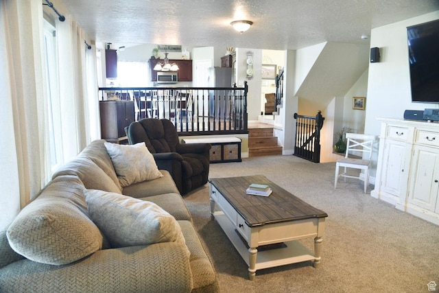 14114 S 3600 W, Bluffdale, UT 84065 - carpeted living room with a chandelier, a textured ceiling, and baseboards