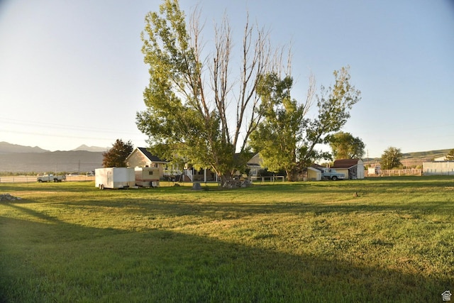 14114 S 3600 W, Bluffdale, UT 84065 - view of grassy yard featuring a mountain view
