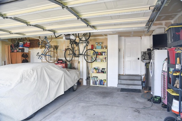 14114 S 3600 W, Bluffdale, UT 84065 - garage featuring a garage door opener