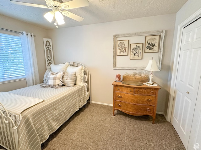 14114 S 3600 W, Bluffdale, UT 84065 - bedroom with carpet, a closet, baseboards, a textured ceiling, and ceiling fan