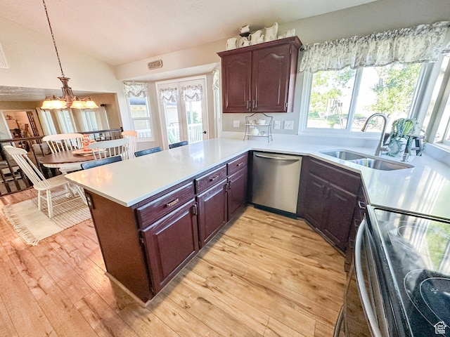 14114 S 3600 W, Bluffdale, UT 84065 - kitchen featuring stainless steel appliances, a sink, light countertops, light wood-style flooring, and vaulted ceiling