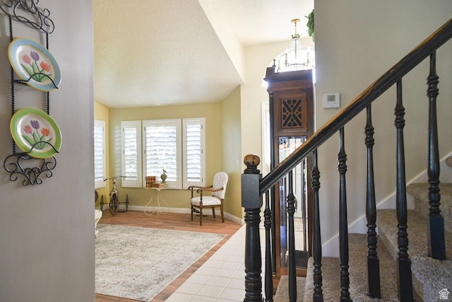 14114 S 3600 W, Bluffdale, UT 84065 - entrance foyer featuring stairs, baseboards, vaulted ceiling, and tile patterned flooring