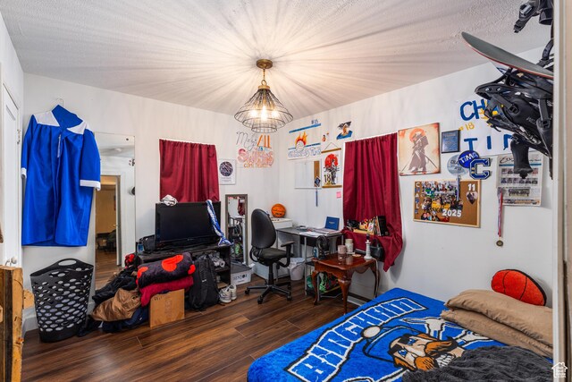 824 N 200 E, Price, UT 84501 - bedroom featuring wood finished floors, a chandelier, and a desk
