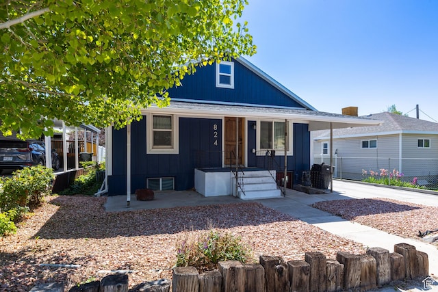 824 N 200 E, Price, UT 84501 - bungalow-style home with covered porch and board and batten siding