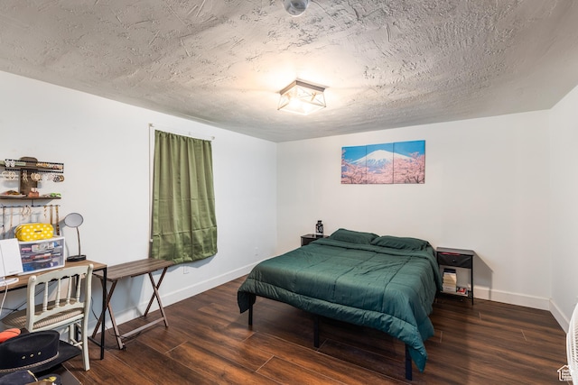 824 N 200 E, Price, UT 84501 - bedroom featuring wood finished floors, baseboards, and a textured ceiling