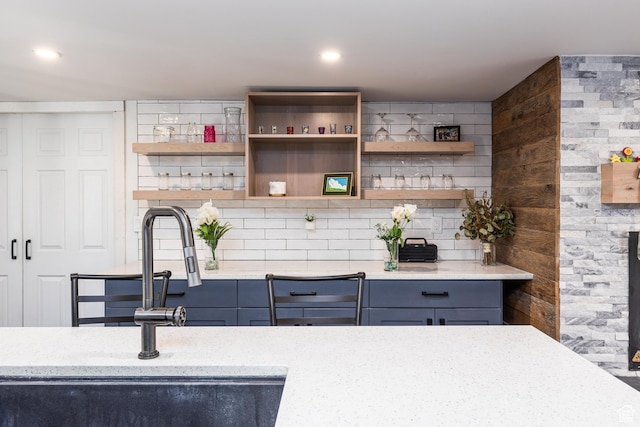 824 N 200 E, Price, UT 84501 - bar featuring a sink and decorative backsplash