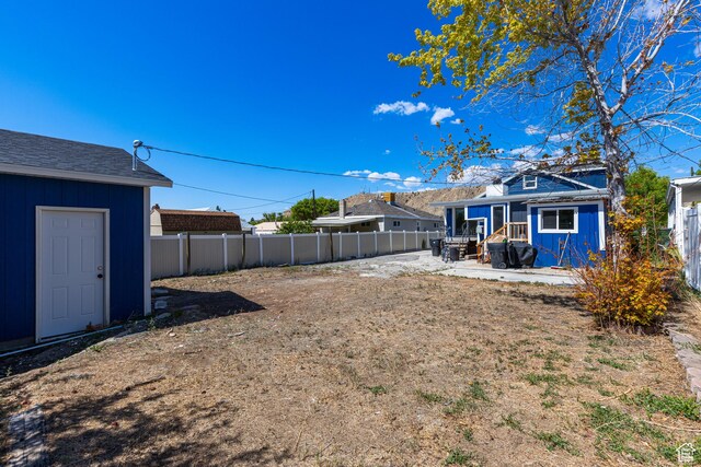 824 N 200 E, Price, UT 84501 - fenced backyard featuring a patio area and an outdoor structure