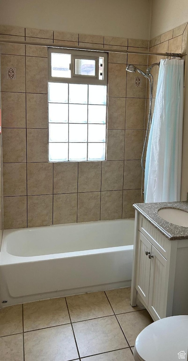 734 S 1300 E, Salt Lake City, UT 84102 - bathroom featuring vanity, tile patterned floors, shower / tub combo with curtain, and toilet