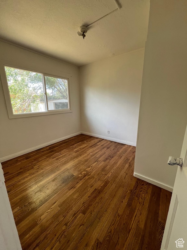 374 S 900 W, Cedar City, UT 84720 - unfurnished room with a textured ceiling, wood finished floors, and baseboards