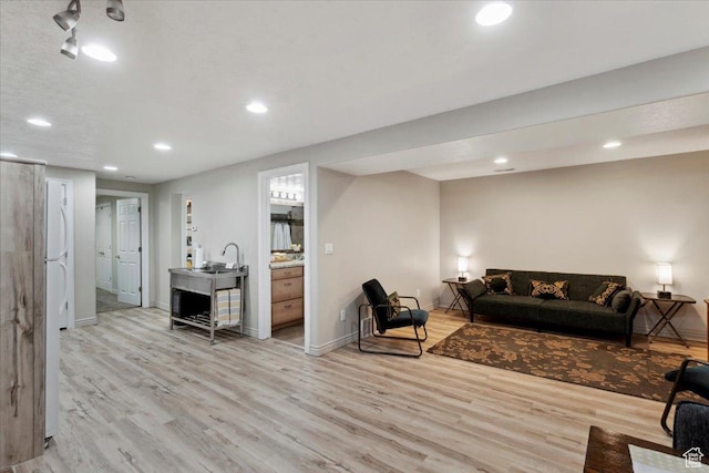 434 E 900 N, North Salt Lake, UT 84054 - living room featuring wood finished floors, recessed lighting, and baseboards