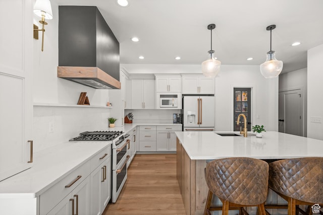 4681 W 75 N, West Point, UT 84015 - kitchen featuring high quality appliances, wall chimney exhaust hood, open shelves, light countertops, and recessed lighting