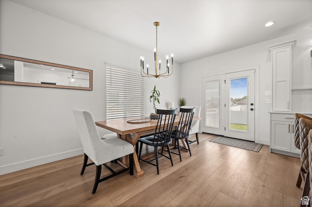 4681 W 75 N, West Point, UT 84015 - dining area featuring a chandelier, light wood finished floors, baseboards, and recessed lighting