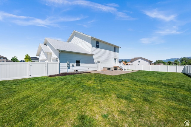 4681 W 75 N, West Point, UT 84015 - rear view of property featuring a gate, a patio, and stairway