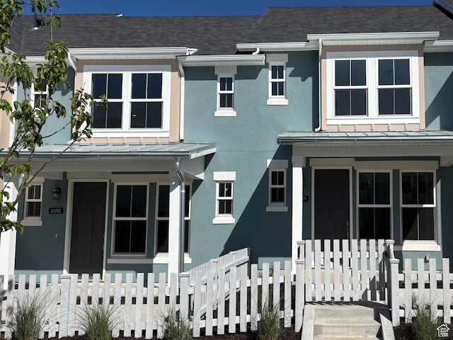 11197 S Rummy Way S, South Jordan, UT 84009 - townhome / multi-family property featuring covered porch, a standing seam roof, metal roof, and a shingled roof