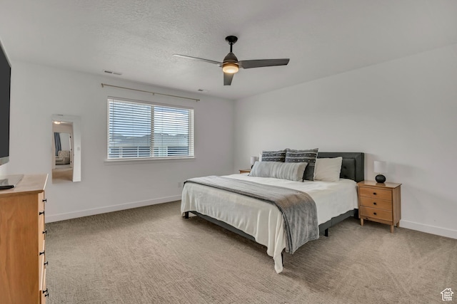 4214 E Sun Crest Dr Unit Lot68, Eagle Mountain, UT 84005 - bedroom featuring baseboards, light carpet, a ceiling fan, and a textured ceiling