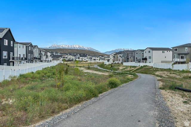 4214 E Sun Crest Dr Unit Lot68, Eagle Mountain, UT 84005 - view of asphalt street featuring a residential view and a mountain view