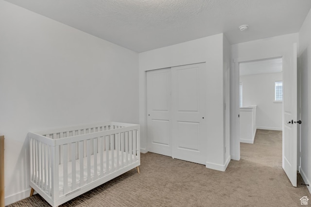 4214 E Sun Crest Dr Unit Lot68, Eagle Mountain, UT 84005 - bedroom featuring light carpet, a closet, and baseboards