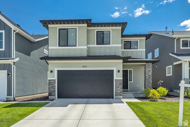 4214 E Sun Crest Dr Unit Lot68, Eagle Mountain, UT 84005 - view of front of property with stone siding, a garage, driveway, and board and batten siding