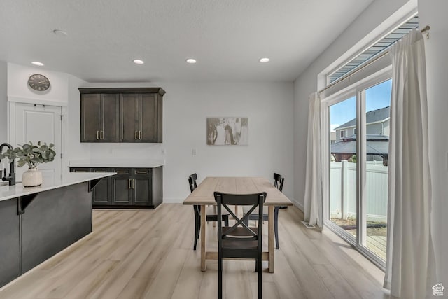 4214 E Sun Crest Dr Unit Lot68, Eagle Mountain, UT 84005 - dining area featuring light wood-style flooring, recessed lighting, and baseboards