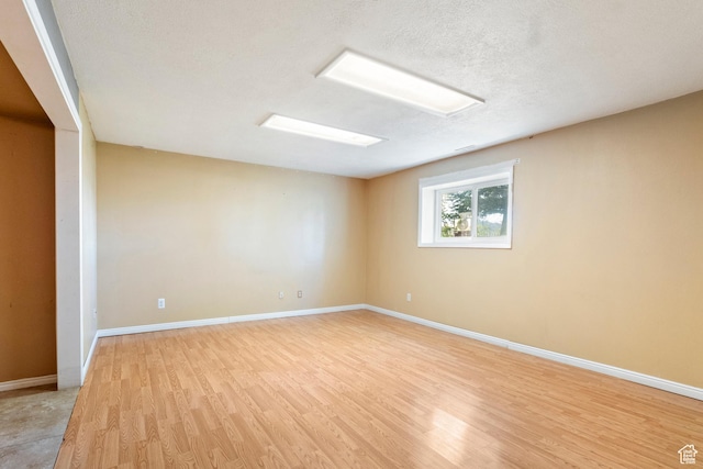 793 E 100 S, Hyrum, UT 84319 - unfurnished room with light wood-type flooring and baseboards