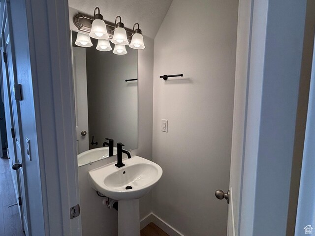 6889 W S Jordan Pkwy, South Jordan, UT 84009 - bathroom with vaulted ceiling and a sink