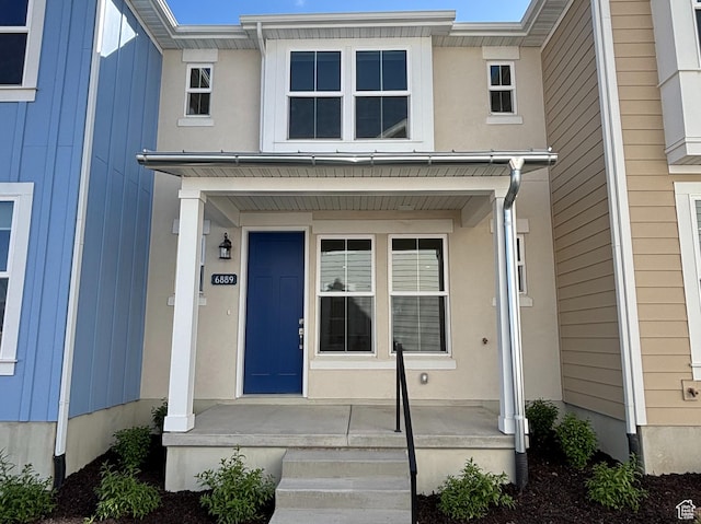 6889 W S Jordan Pkwy, South Jordan, UT 84009 - property entrance featuring covered porch