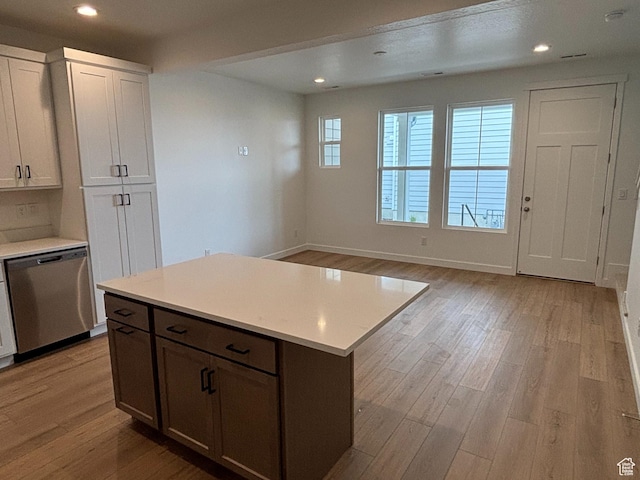 6889 W S Jordan Pkwy, South Jordan, UT 84009 - kitchen featuring dishwasher, light wood finished floors, light countertops, baseboards, and recessed lighting