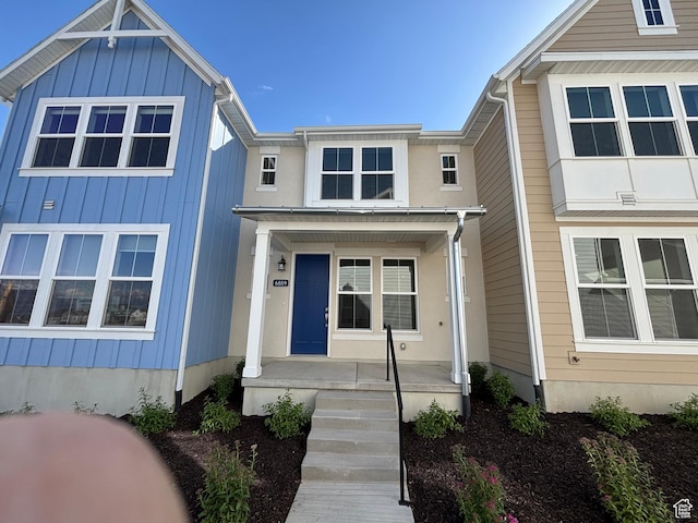6889 W S Jordan Pkwy, South Jordan, UT 84009 - view of front of property with covered porch and board and batten siding